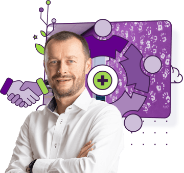 Jan Kaštura stojí s rukama zkříženýma před grafikou znázorňující spolupráci a zdravotní péči.